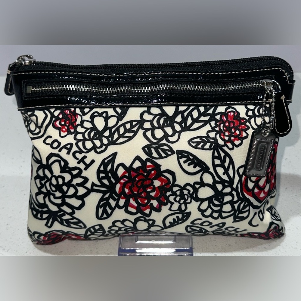 Coach Poppy Daisy Floral Graffiti wristlet with patent leather trim